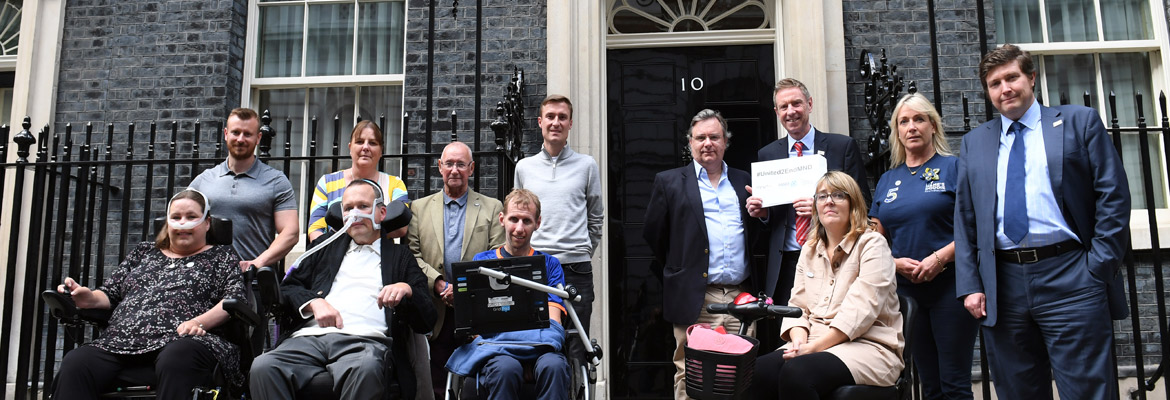 group of people outside number 10