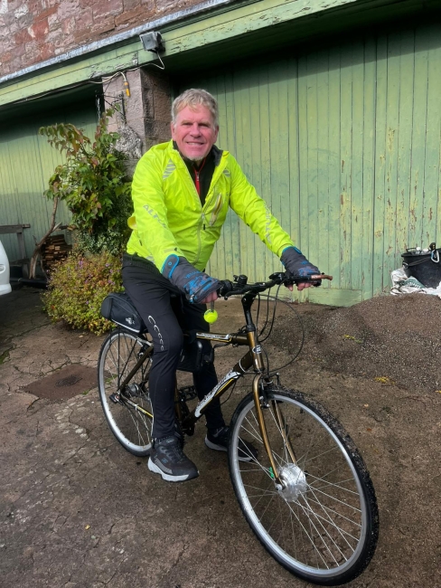 Martin on his adapted bike during his coast-to-coast fundraiser